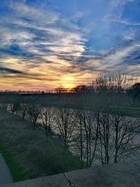 Scenic view of dramatic sky over landscape