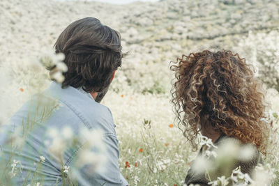 Rear view of woman looking away