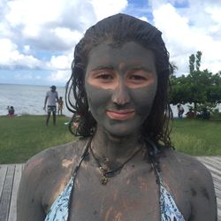 Portrait of beautiful young woman on beach