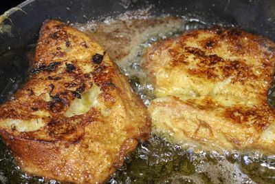 High angle view of meat in frying pan