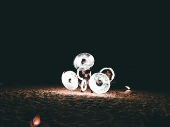 Close-up of lighting equipment on sand