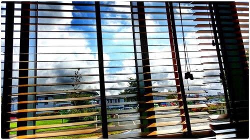 Building reflecting in water