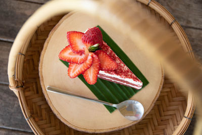 High angle view of fruits in basket on table