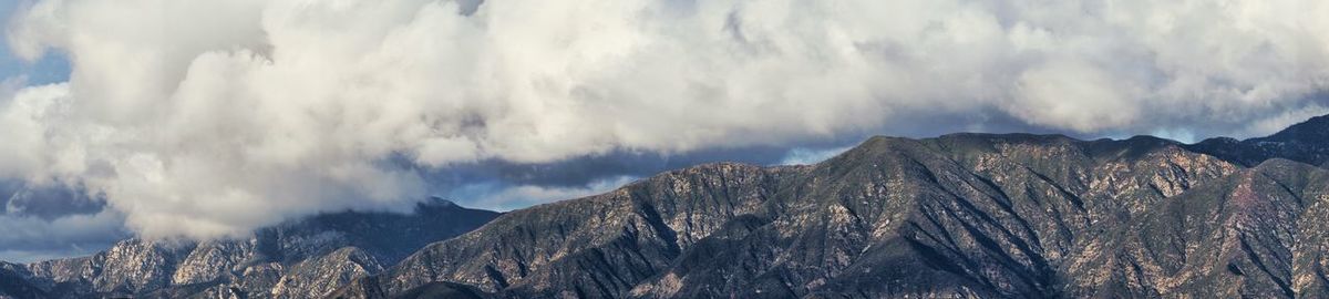 Panoramic view of majestic mountains against sky
