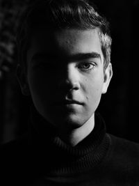 14 years old boy portrait light and shadow in black and white