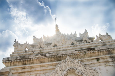 Low angle view of temple building against sky