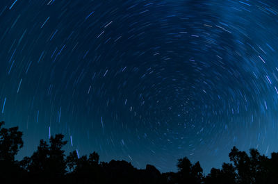 Low angle view of star field against sky at night