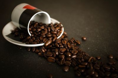 Close-up of coffee beans on table