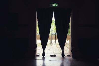 Shadow of person on door at home