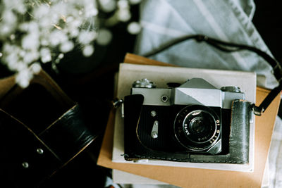 High angle view of camera on table