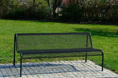 Empty bench in park