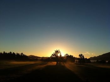 Scenic view of landscape at sunset