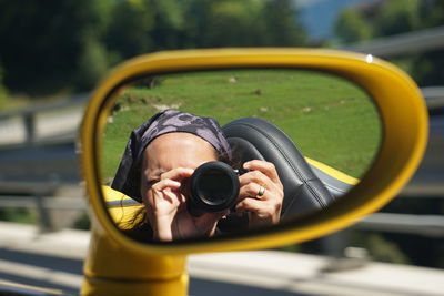 Portrait of man photographing