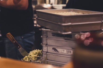 Close-up of food in container at restaurant kitchen