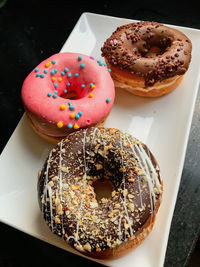 Close-up of donuts in plate