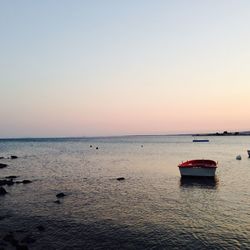 Scenic view of sea at sunset