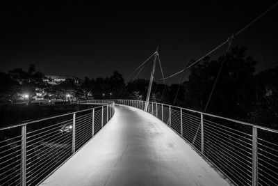 Bridge against sky at night