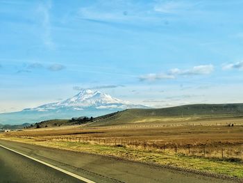 Scenic view from highway against snow covered mt shasta in northern california. 