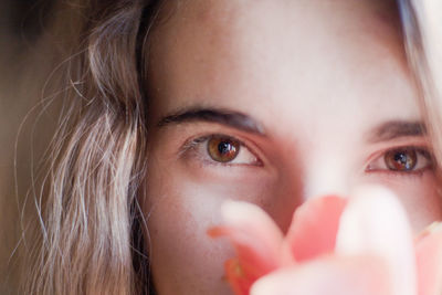 Close-up portrait of young woman
