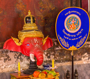 Statue of buddha outside building
