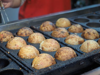 Close-up of person preparing food