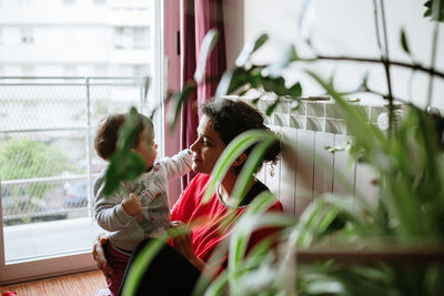 Mother with daughter at home