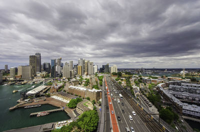 High angle view of city against cloudy sky