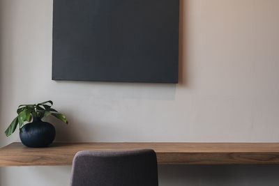 Potted plant on table at home