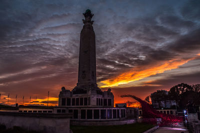 Low angle view of statue at sunset