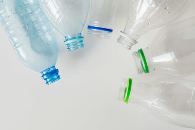 High angle view of glass bottle on table