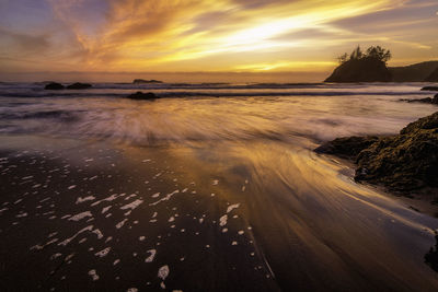 Scenic view of sea against sky during sunset