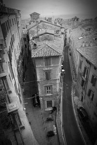 High angle view of street amidst buildings in city