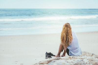 Blond girl on the beach 