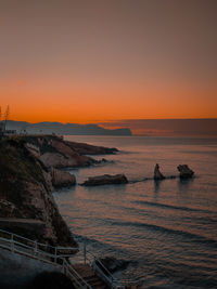 Scenic view of sea against sky during sunset