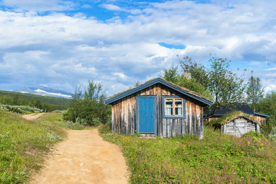 Mountain hut at a path in the swedish mountains