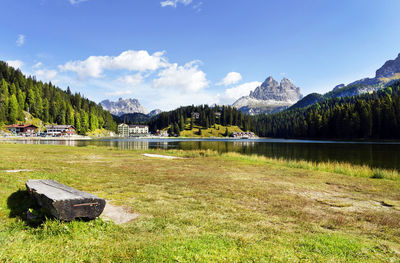 Scenic view of lake and mountains against sky