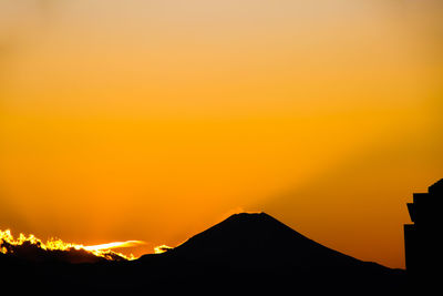 Silhouette of mountain during sunset