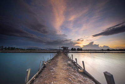 Scenic view of sea against sky at sunset