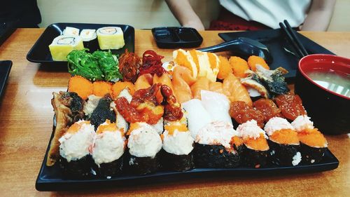 Close-up of sushi served on table