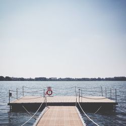 Scenic view of calm sea against clear sky