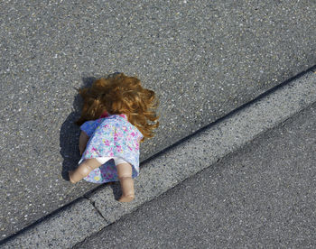 High angle view of girl on road