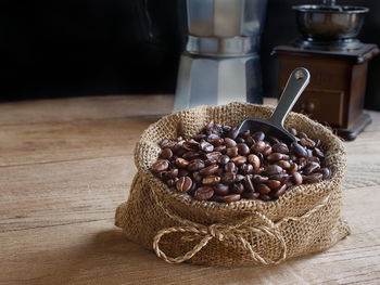 Close-up of coffee beans on table