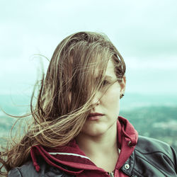 Portrait of woman with tousled hair