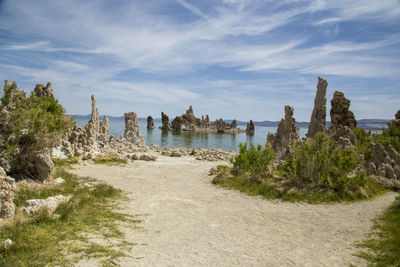Panoramic view of trees and buildings against sky