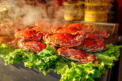 High angle view of meat on barbecue grill