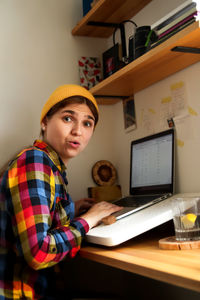 Portrait of young businesswoman working at office