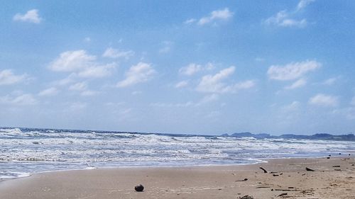 Scenic view of beach against sky