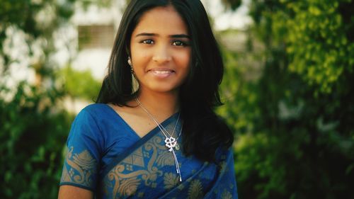 Portrait of smiling young woman