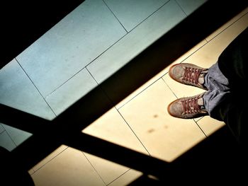 Low section of person standing on floor