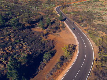 High angle view of highway amidst trees